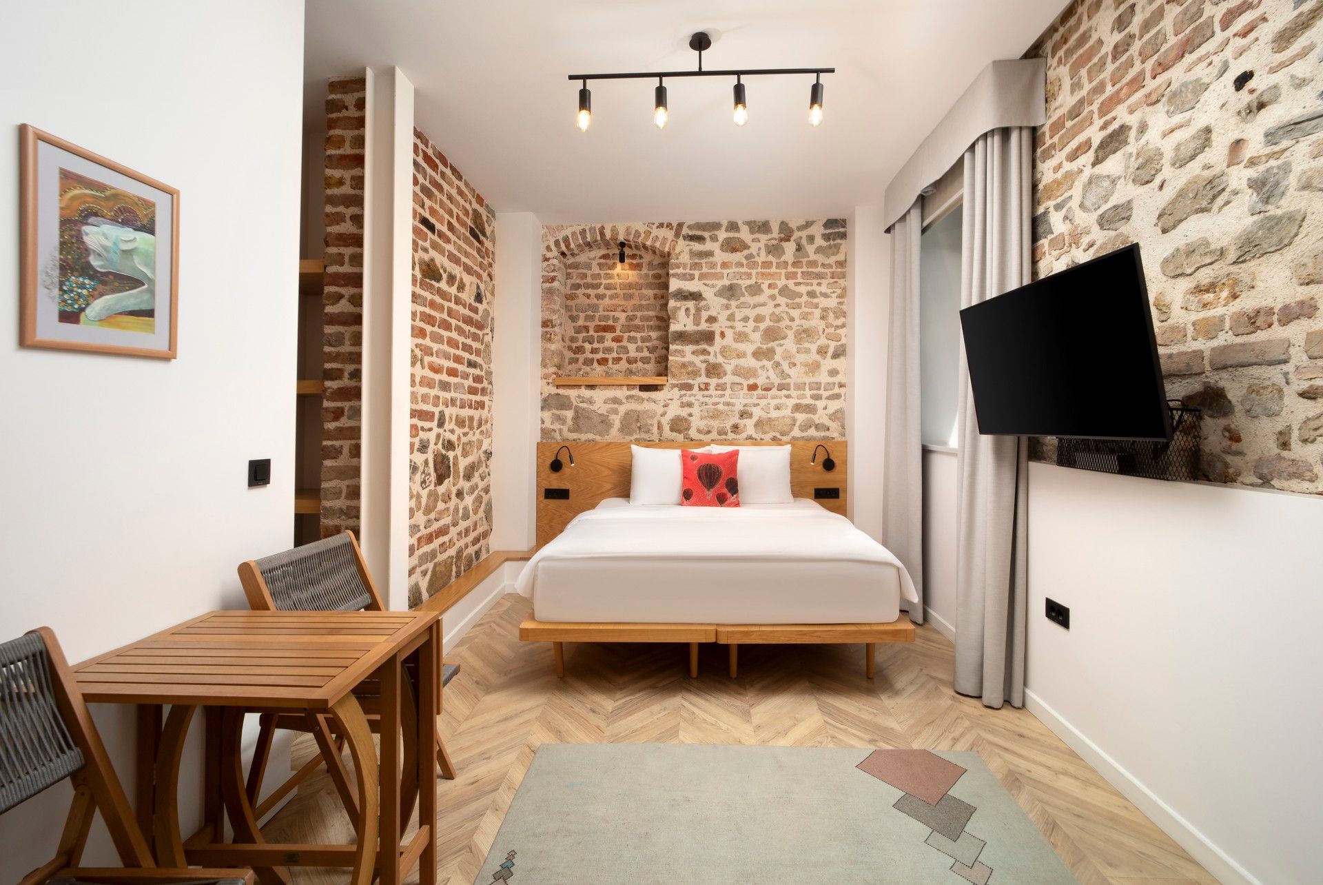 Studio Flat at Hammamhane — interior view in warm natural light.